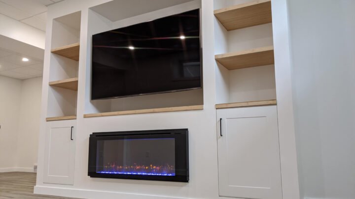 Picture of a basement built-in unit with fireplace.